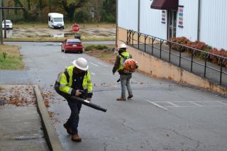 people leafblowing